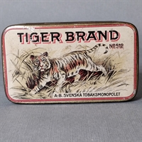 flot tiger på låger af gammel metal tobaksdåse Tiger Brand A.B.Svenska Tobaksmonopolet genbrug